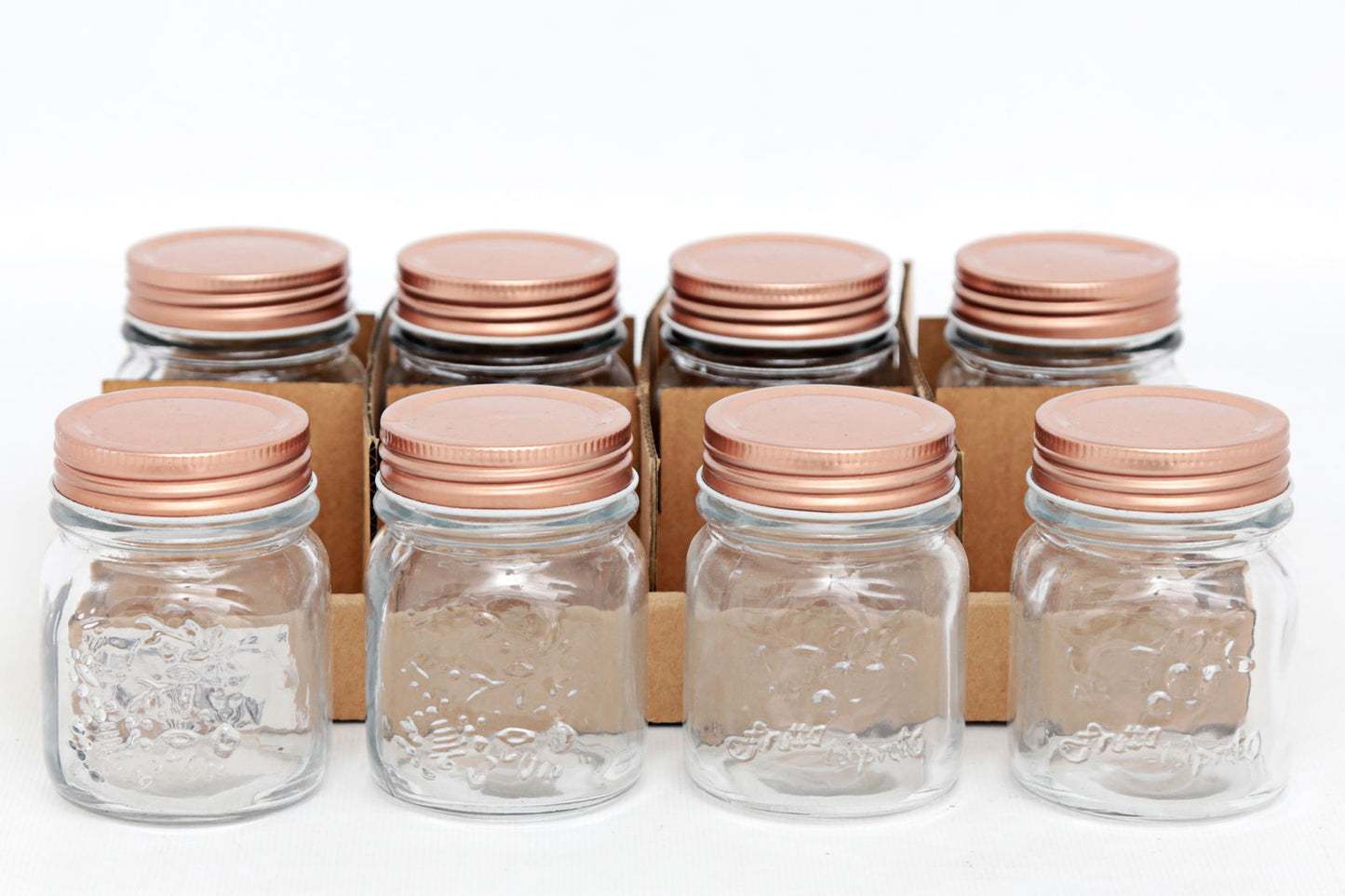 Small Kitchen Glass Storage Jar with Copper Lid Embossed Design