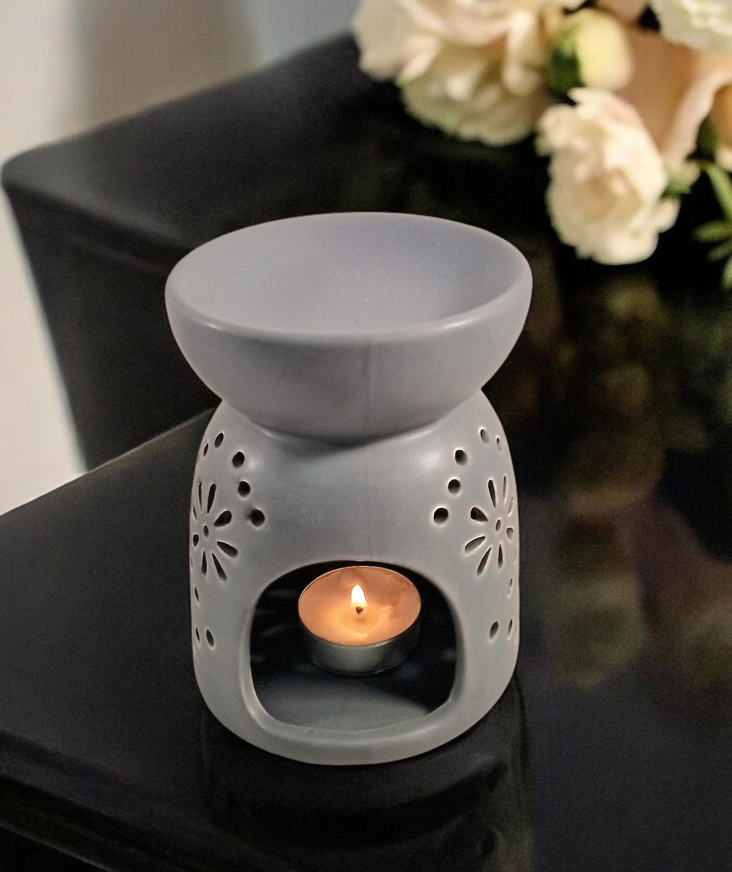 Grey Oil Burner with Patterned Holes Perfect for Home Decor